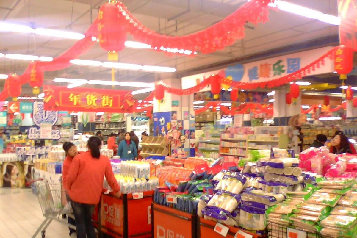 A supermarket aisle in the week before the school year begins.