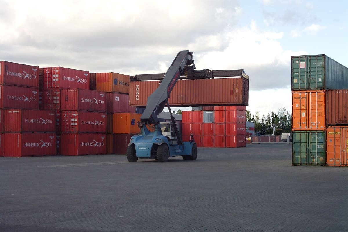 Containers at a terminal. Roughly a tenth of global container traffic uses the reclassified route.