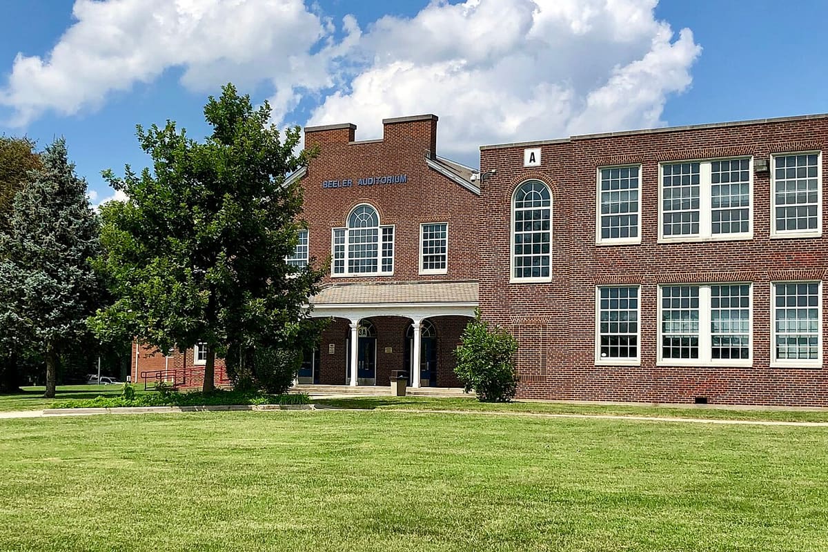 A high school that stores phones for the full day. Test results did not move; discipline did.