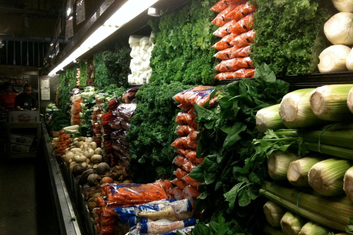 The produce section of a supermarket, where store brands offer almost no saving.