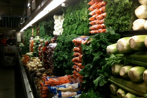 The produce section of a supermarket, where store brands offer almost no saving.